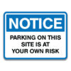 PARKING ON THIS SITE IS AT YOUR OWN RISK SIGN
